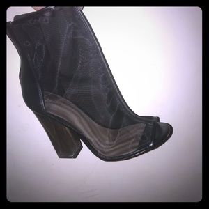 Sheer peep toe ankle boots.